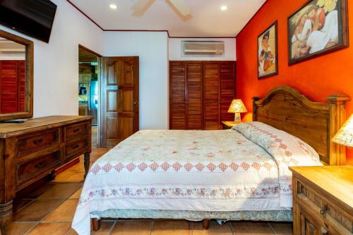 Warm Interiors and Orange Hues on Ground Floor in Front of Beach