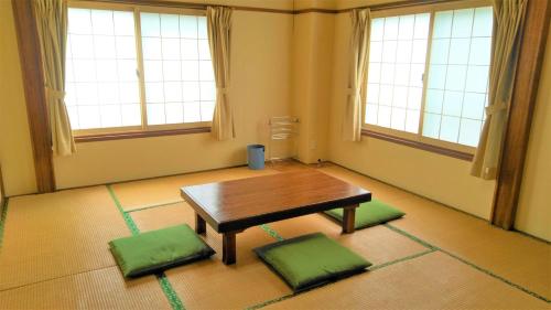 Quadruple Room with Shared Bathroom