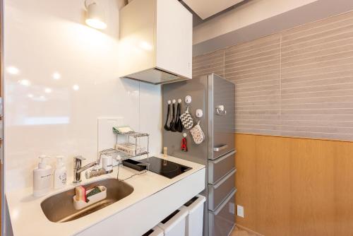 plat hostel keikyu asakusa station, Tokio (fotografie 10)