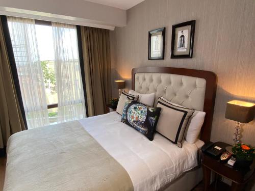Four Doors Hotel Room Type - Deluxe Triple Room with Sea View