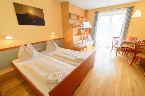 1 double bed, 2 twin beds, 1 sofa bed