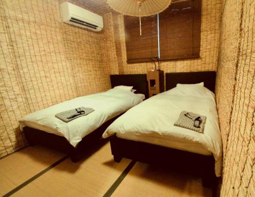 Twin Room with Private External Bathroom and Tatami Floor - Teshigawara