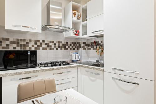 Kitchen, GuestHost - Pratello Il Gelso Apartments in Saragozza