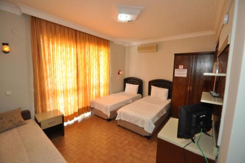 Defne & Zevkim Hotel - image 12
