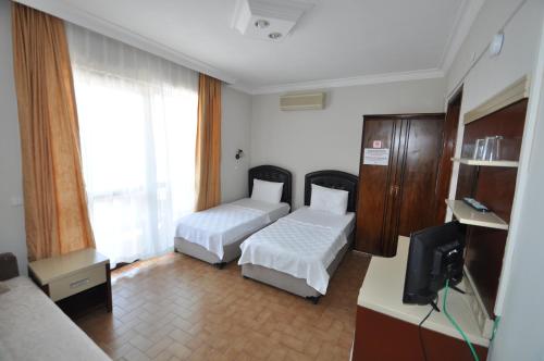 Defne & Zevkim Hotel - image 9
