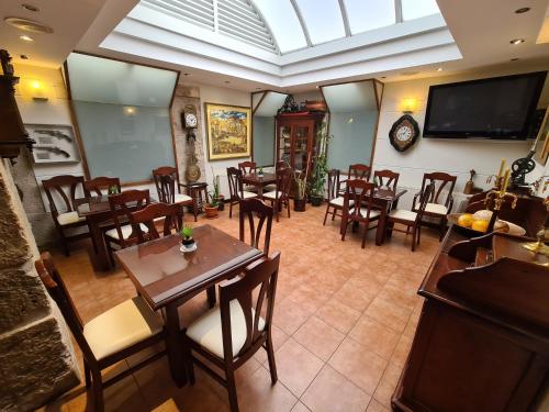 gedeelde lounge/tv-ruimte, Hotel Jacobeo in Burgos