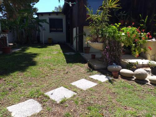 Brezza di mare , appartamento in Villa fronte mare con giardino, casa vacanze gîte à louer Sestu