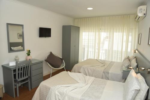 Flor da Primavera - Residencial e Apartamentos in อซามบูจา