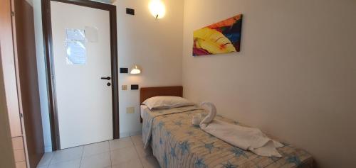 Attic Single room with balcony room in Hotel Vela Azzurra