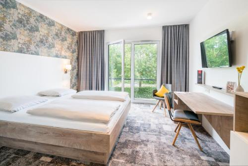 Stadthotel Lohne, Self Check-in & entspannt im Café frühstücken, Lohne
