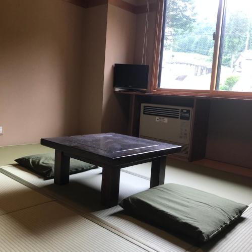 Single Room with Shared Shower and Toilet