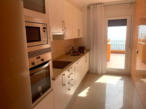 廚房, Piso 3 dormitorios en Isla del Fraile Golf Resort con espectaculares vistas in 洛卡