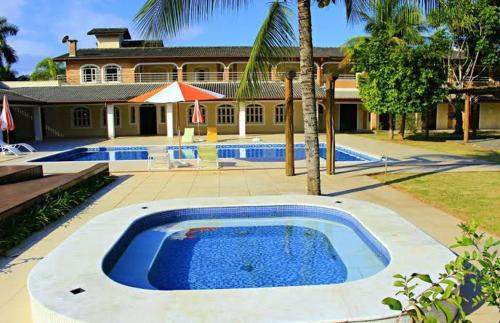 Pousada Porto do Rio Located in Porto Novo, Pousada Porto do Rio is a perfect starting point from which to explore Caraguatatuba. The property offers guests a range of services and amenities designed to provide comfort an