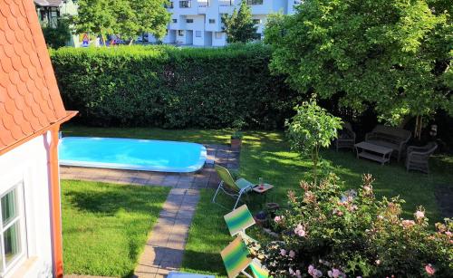 Kert, Christl - Apartment mit Garten und Pool zur Mitbenutzung in Hietzing-West