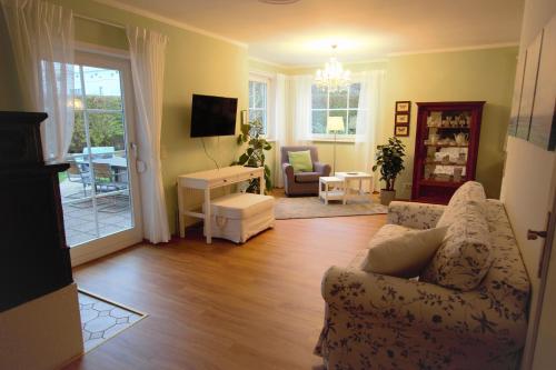 Közös társalgó / TV, Christl - Apartment mit Garten und Pool zur Mitbenutzung in Hietzing-West