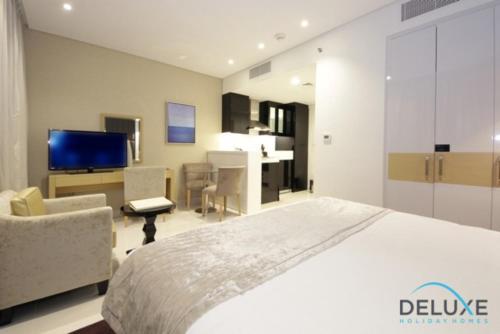 Deluxe Studio Apartment in Damac Maison Canal Views by Deluxe Holiday Homes - image 3