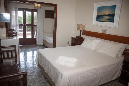 Pousada Porto dos Casais Pousada Porto dos Casais is perfectly located for both business and leisure guests in Praia Do Rosa. The property features a wide range of facilities to make your stay a pleasant experience. Free Wi-F