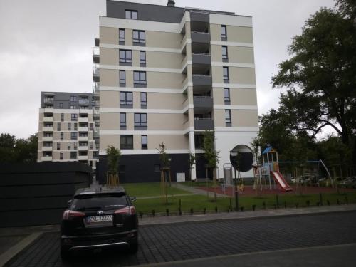 Játszótér, Apartament Szmaragdowy Platan in Wyspa Solna