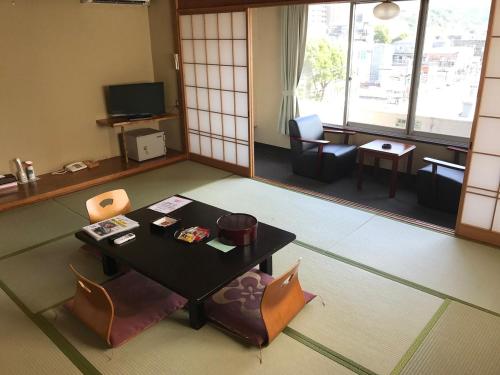 Itoen Hotel Bekkan Located in Ito, Itoen Hotel Bekkan is a perfect starting point from which to explore Atami. Offering a variety of facilities and services, the property provides all you need for a good nights sleep. 