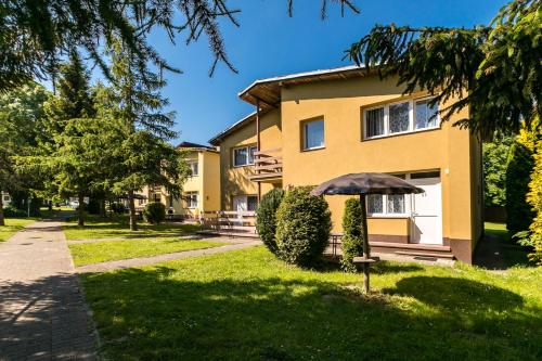 Apartamenty pod Modrzewiem Apartamenty pod Modrzewiem