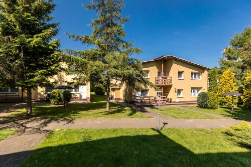 Apartamenty pod Modrzewiem Apartamenty pod Modrzewiem