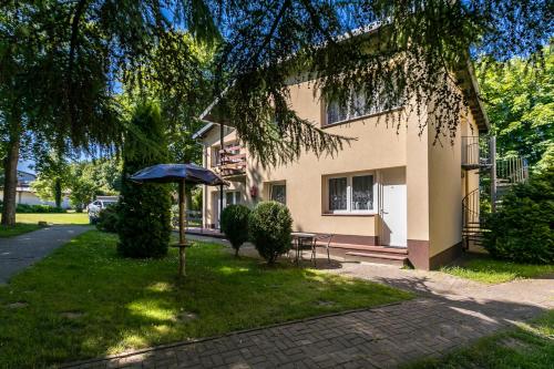 Apartamenty pod Modrzewiem Apartamenty pod Modrzewiem