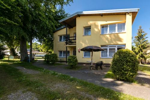 Apartamenty pod Modrzewiem Apartamenty pod Modrzewiem