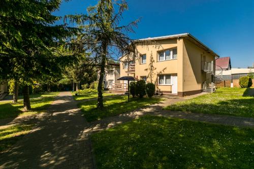 Apartamenty pod Modrzewiem Apartamenty pod Modrzewiem