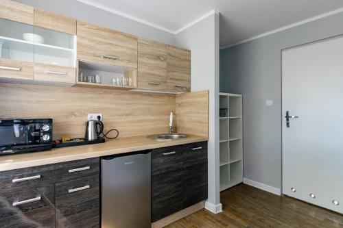 Apartamenty pod Modrzewiem Apartamenty pod Modrzewiem