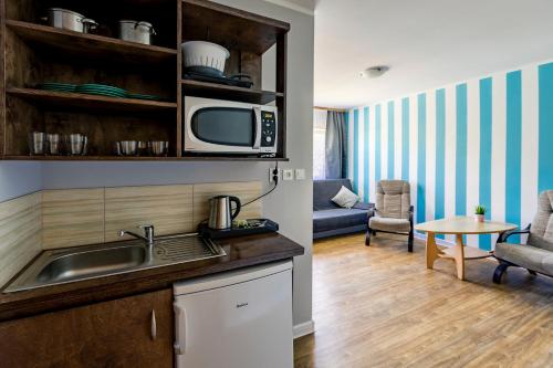 Apartamenty pod Modrzewiem Apartamenty pod Modrzewiem