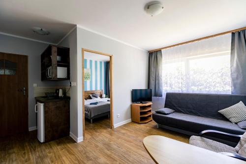 Apartamenty pod Modrzewiem Apartamenty pod Modrzewiem