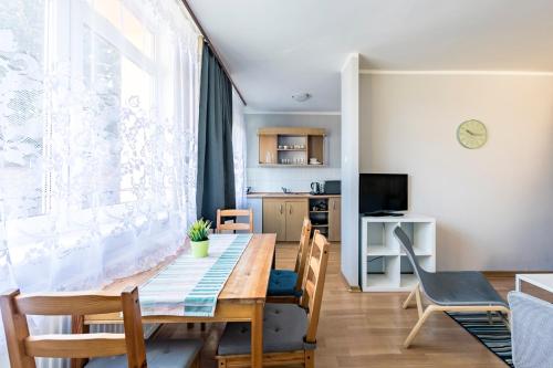 Apartamenty pod Modrzewiem Apartamenty pod Modrzewiem