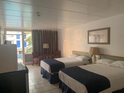Standard Room with Two Double Beds and Pool View
