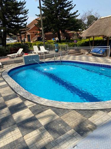 Swimming pool, Lake Victoria Country Home in Entebbe