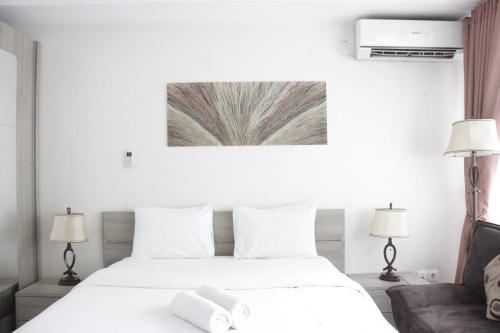 Pleasant Studio Room at Beverly Dago Apartment near ITB By Travelio