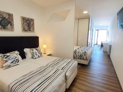 1 double bed, 2 twin beds, 1 sofa bed