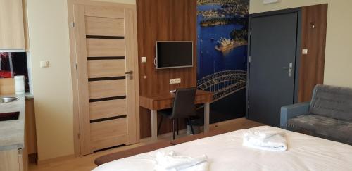 Metropolis Apartamenty Centrum - image 7
