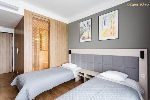 Apartament w Warszawie dedykowany parking podziemny w cenie, WiFi, AC, blisko centrum New apartment in Warsaw finished to a high specification fitted out to a high standard on the 7th floor, WiFi, underground parking price included, Варшава (фото 9)