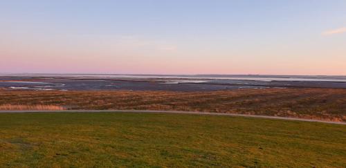 Vannas istaba, Wohnmobilstellplatz Hemenswarft an der Nordsee - Meerblick in Emmelsbull-Horsbull
