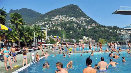 City Scape Lugano - Cozy Apartment for Families with included Business Centre in the heart of Lugano
