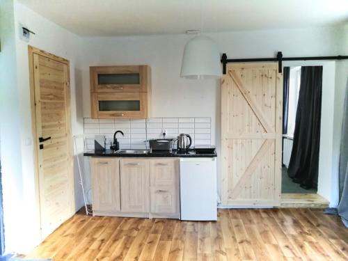 Bezpieczna Przystan - Apartamenty-balia, sauna, narty in Uherce Mineralne