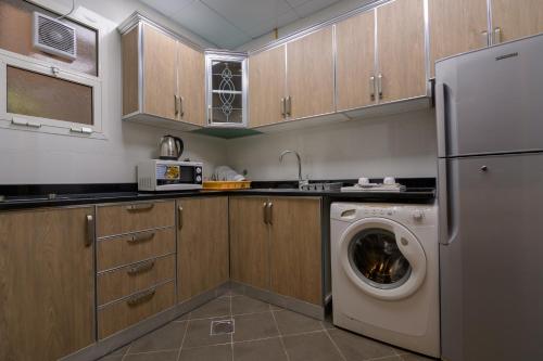 Down Town Plaza Hotel Apartments - Kitchen