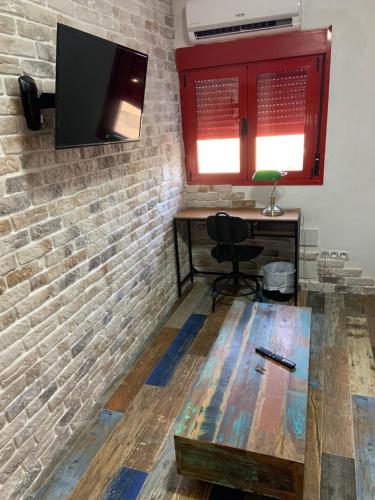 Small Studio Inside a Penthouse on the Border