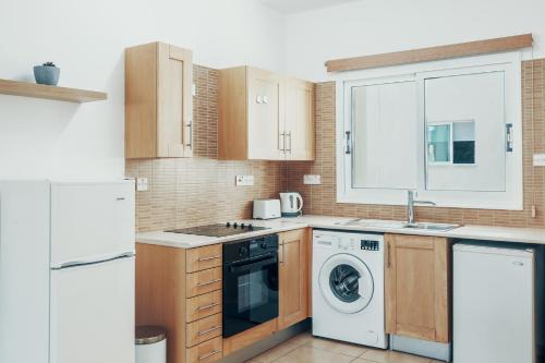 주방, Elegant 1 Bedroom Apartment - Great Kings Resort Protaras, Kapparis in 파랄림니