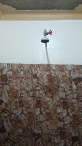 suihku, Hotel Delambiance in Arua