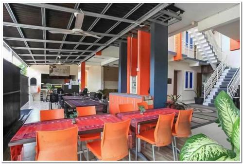 Restaurant, The Nancy's Homestay Pekanbaru Mitra RedDoorz in Tuah Karya