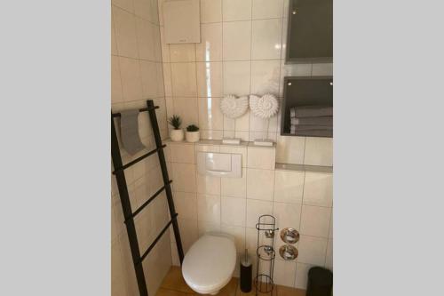 Das Schneckenhaus - Ferienwohnung mit Pool & Seeblick