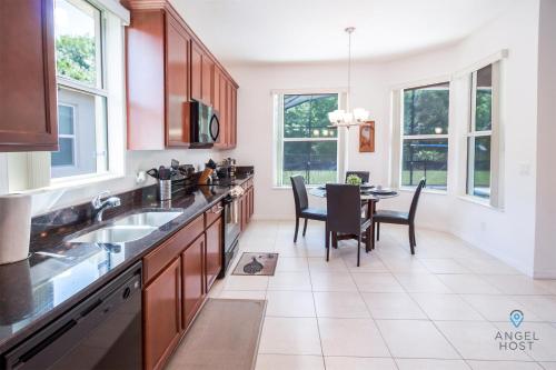 Lovely Home with Private Pool Resort Amenities & Near Disney! - image 7