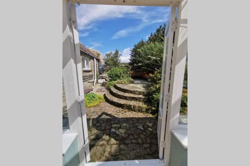 Cosy, Coastal Retreat with a Large Garden Cosy, Coastal Retreat with a Large Garden