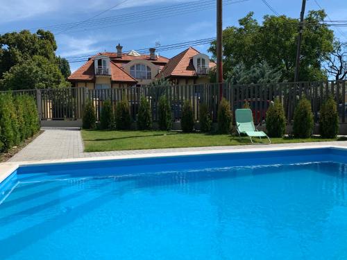 Swimming pool, Naplemente Apartman in Balatonfured